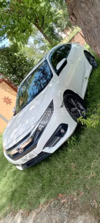 toyota-yaris-sedan-gli-cvt-13-big-0