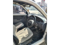 daihatsu-cuore-2008-small-2